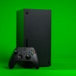 black xbox one console with controller